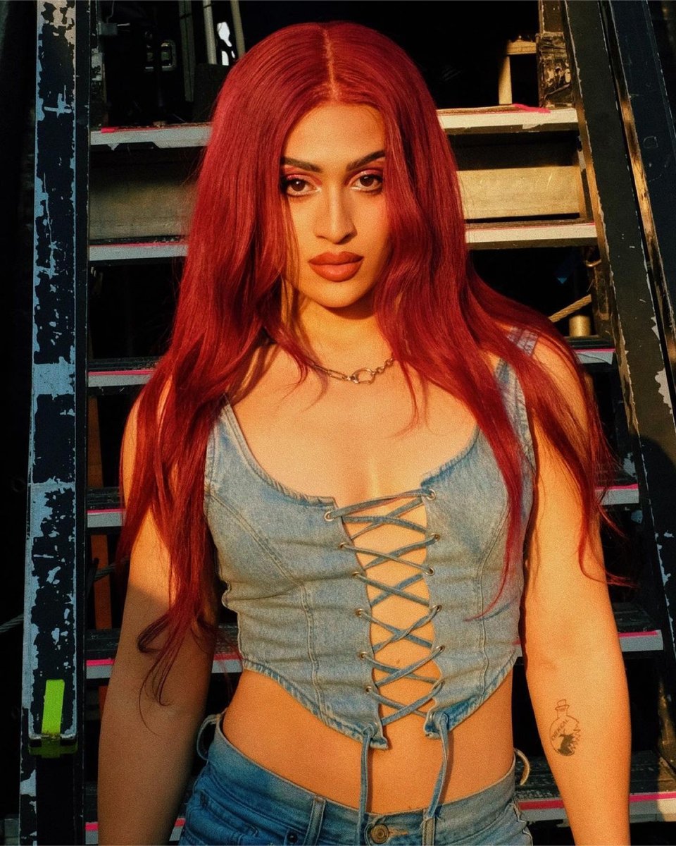 spokesperson, trans, community, red hair, artist