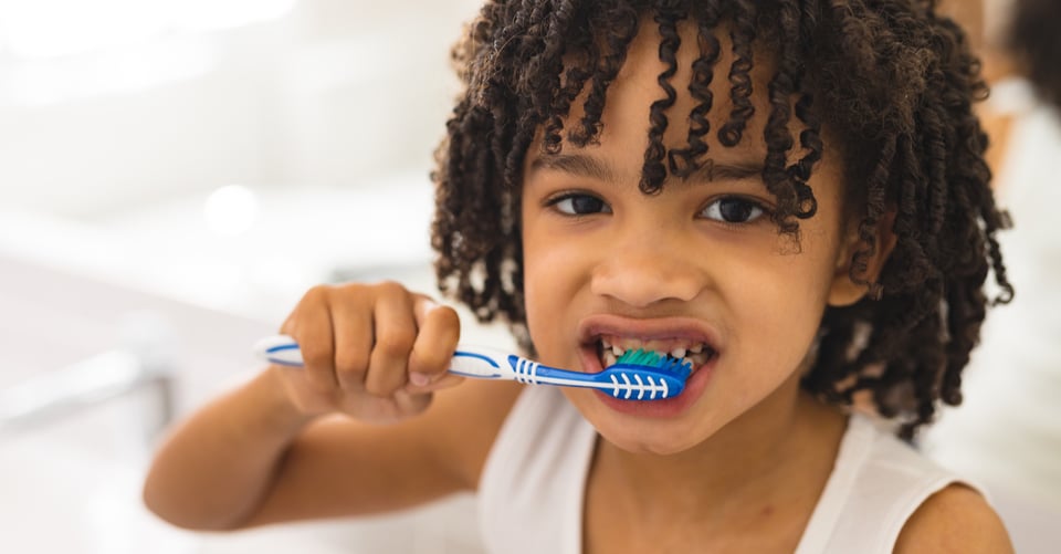 Little boy with cleaning teeth